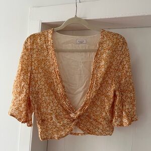 Low cut, cross-over, cropped blouse, gold and white, size medium